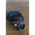 Cable textil negro, florón y portalámparas